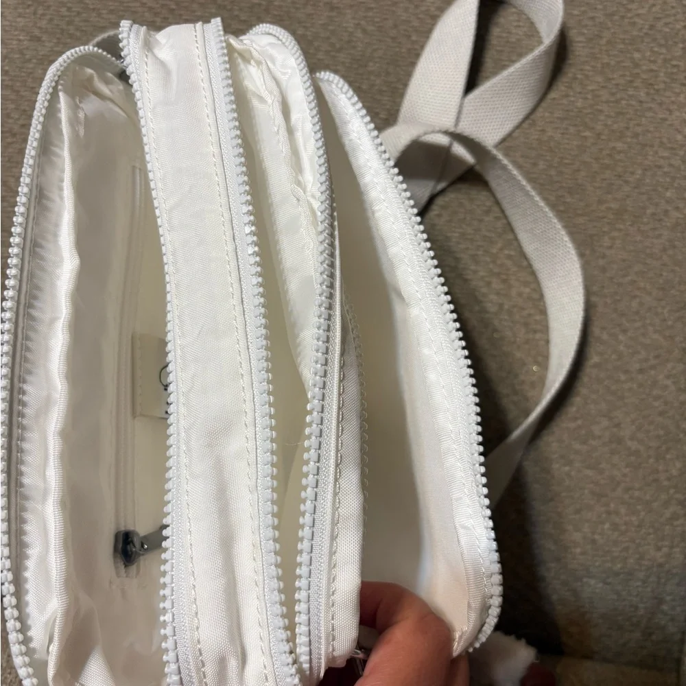 Kipling Small Crossbody Bag in White with Plush Monkey Charm